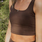 Up close photo of a brown tank top sports bra.